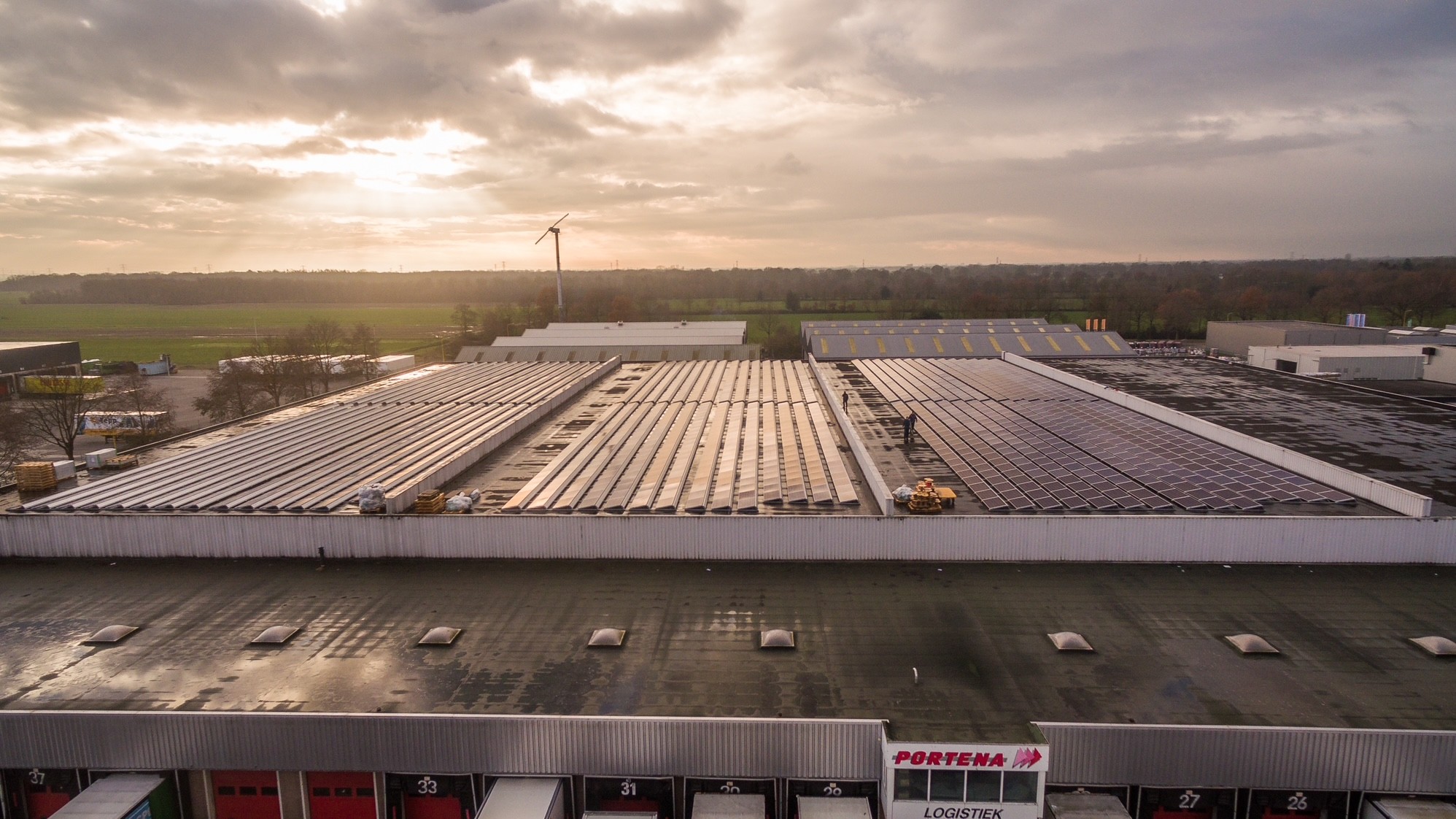 Rooftop installation Portena Logistics at sunset